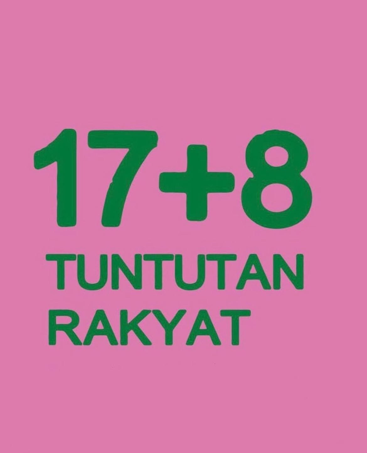 Spanduk perlawanan rakyat berwarna pink dan hijau yang dipegang demonstran