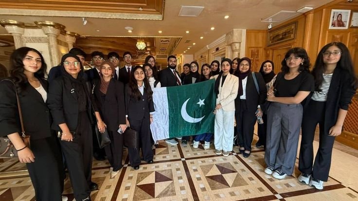 Pakistani content creator recording in home studio Karachi digital economy